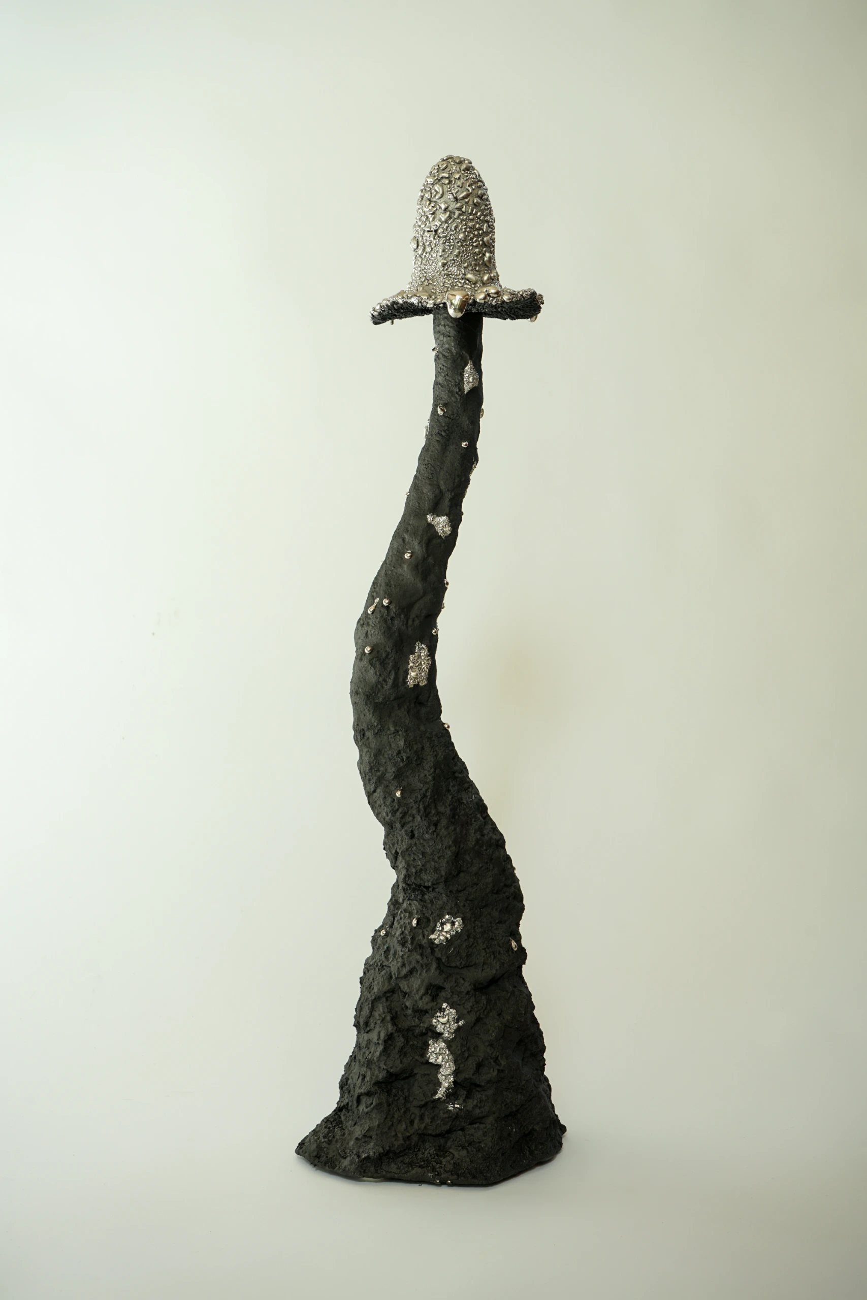 Silver Black Inkcap (2026), ceramic sculpture by Sjors Driessen with a tall dark mushroom-like form finished with textured glaze and reflective silver lustre.