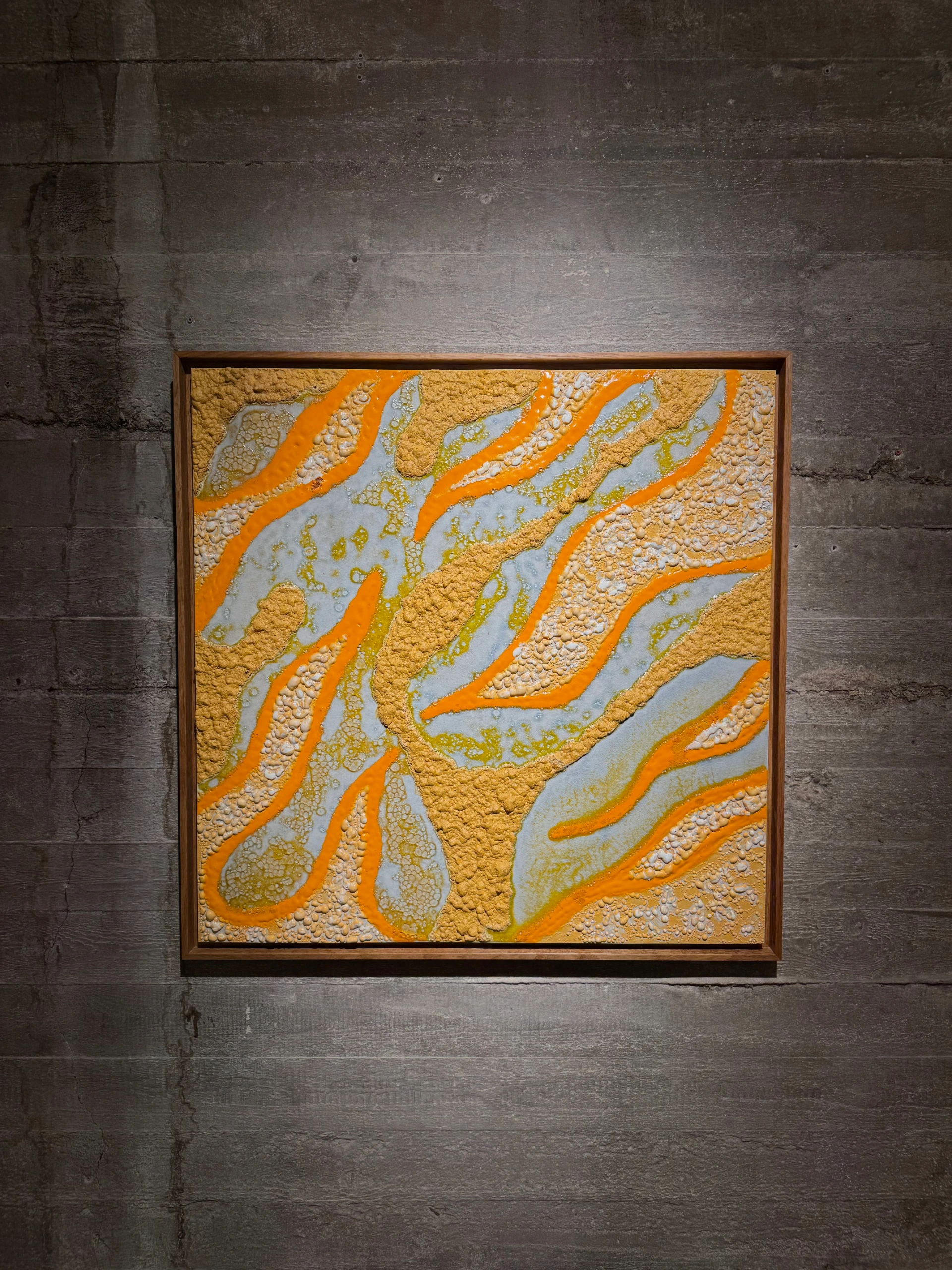 Orange Seas (2025), ceramic wall sculpture by Sjors Driessen combining glazed ceramic elements with American oak in a 93 × 93 cm composition.