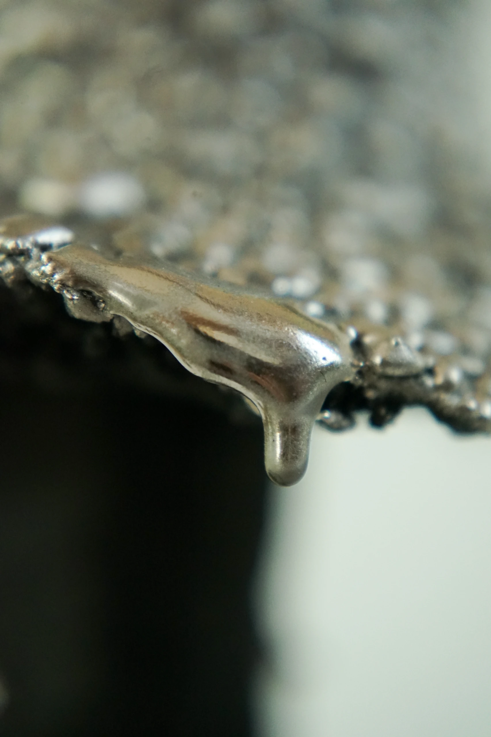 Silver Black Inkcap (2026), ceramic sculpture by Sjors Driessen with a tall dark mushroom-like form finished with textured glaze and reflective silver lustre.